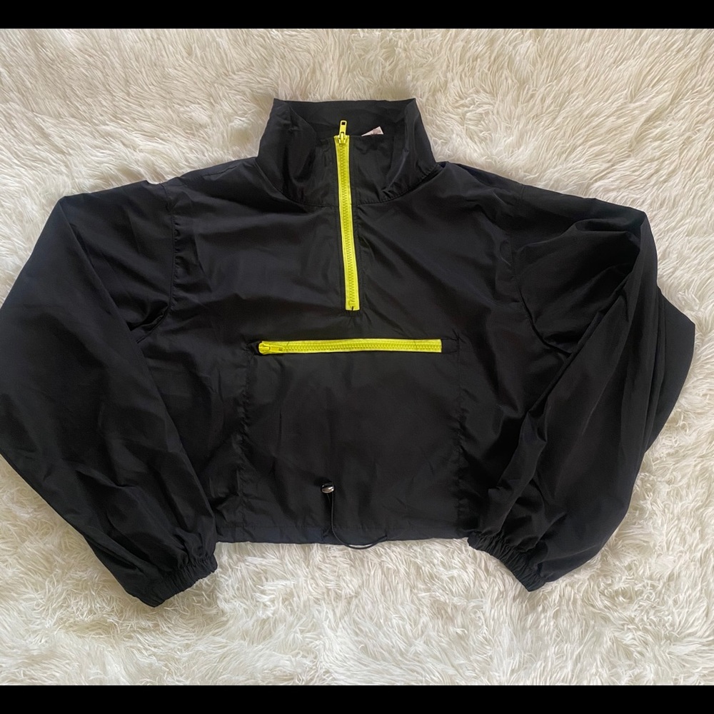 New black windbreaker size L